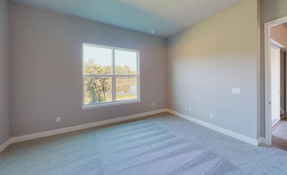 Spacious, unfurnished interior of a new home in Woodhaven, Port Orange (Image 24).