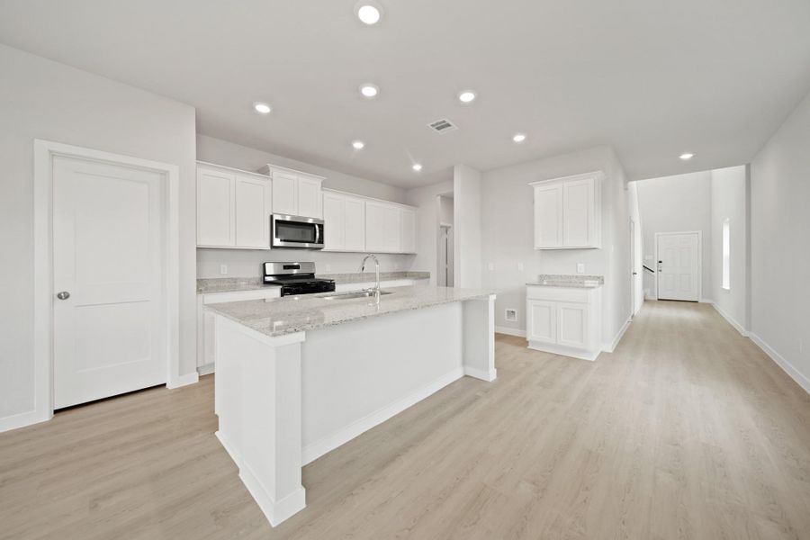 Furnished interior view inside a new home in Riverwood Ranch, Angleton (Image 11).