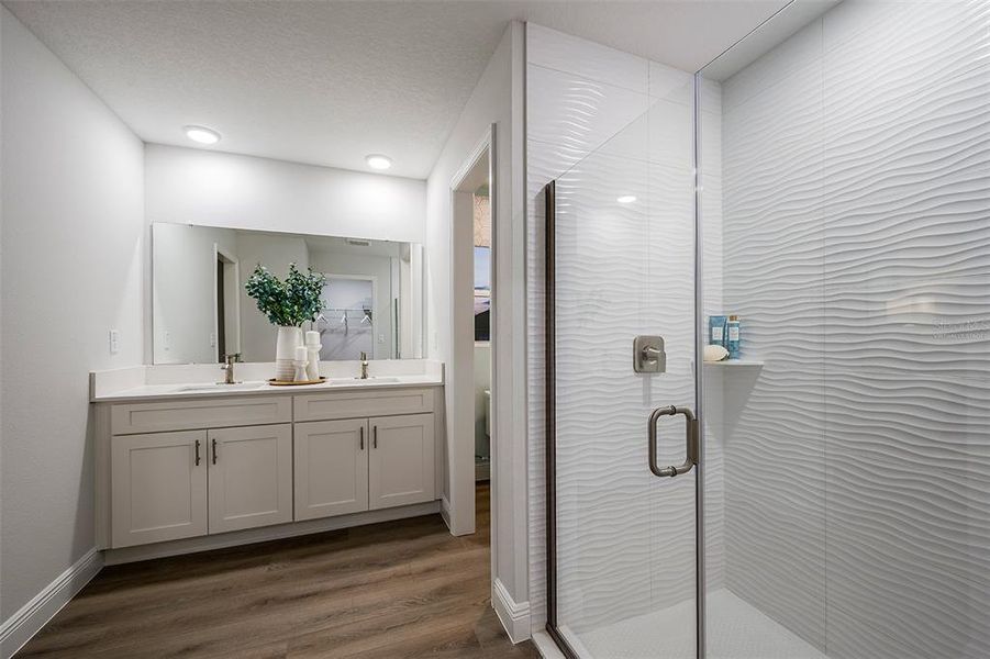 Furnished interior view inside a new home in Pasadena Landing, Wesley Chapel (Image 11).