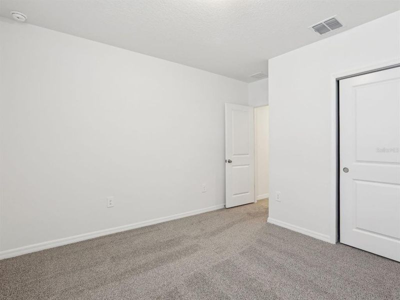 Spacious, unfurnished interior of a new home in The Reserve at Van Oaks, Auburndale (Image 26).