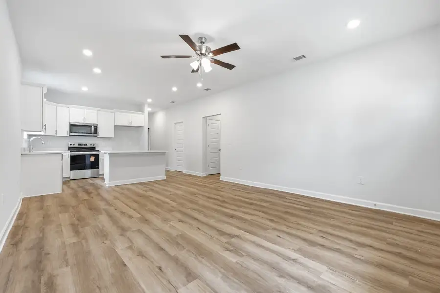Spacious, unfurnished interior of a new home in Live Oak Cottages, Freeport (Image 28). Spacious, unfurnished interior of a new home in Live Oak Cottages, Freeport (Image 28).