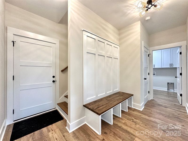 Drop Zone (Garage and Powder Bath to left, Stairs to finished Bonus over Garage, Coat Closet to Right, Laundry @ end of Hall)