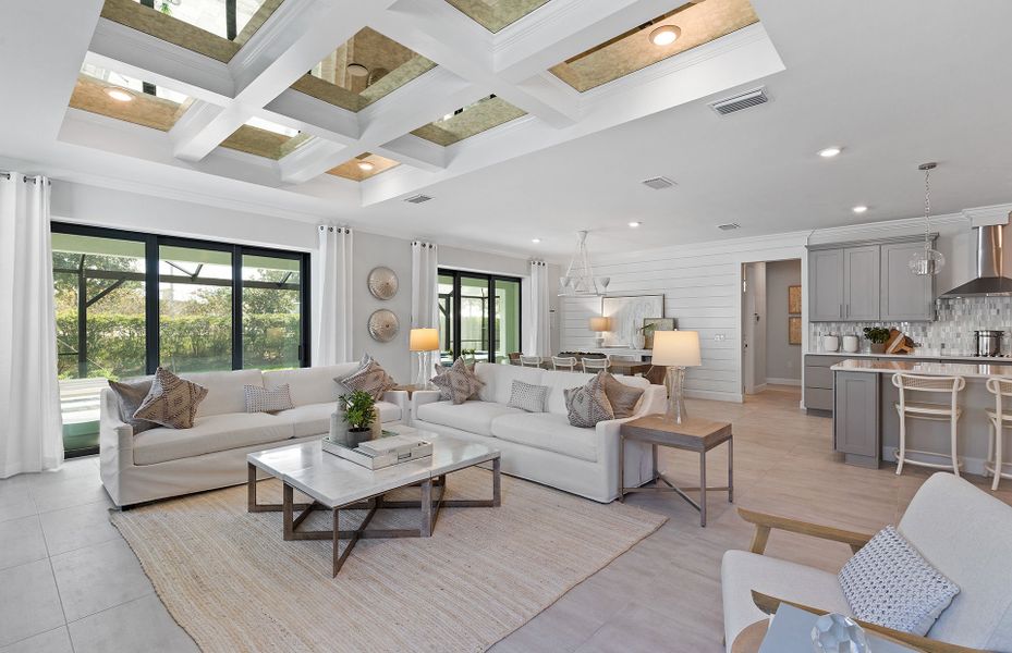 Connected living space with bright windows, perfect feature in a new construction home