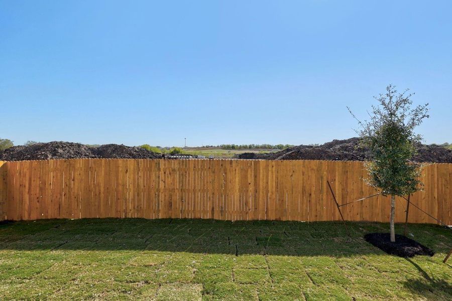 Exterior details and patio area of a home in Prairie Winds, Hutto (Image 2).