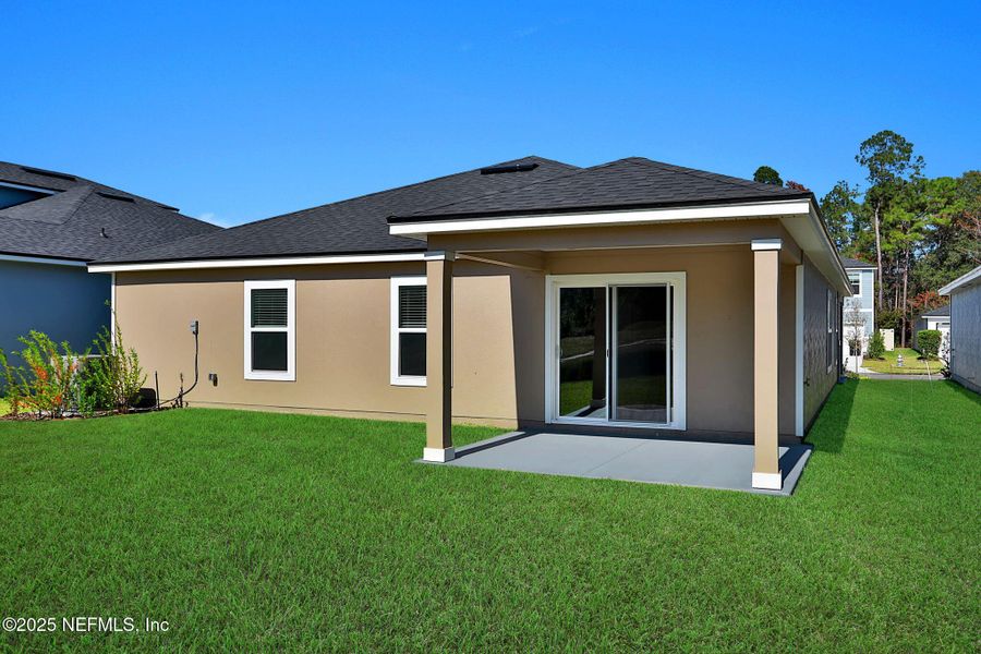Exterior details and patio area of a home in Wilford Oaks, Orange Park (Image 4).