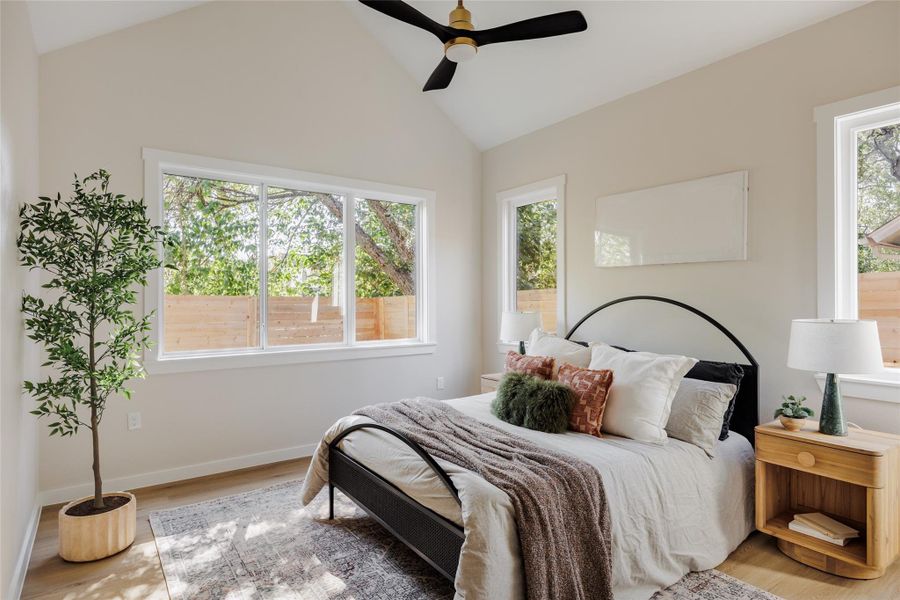 Downstairs Primary Bedroom with vaulted ceilings Downstairs Primary Bedroom with vaulted ceilings