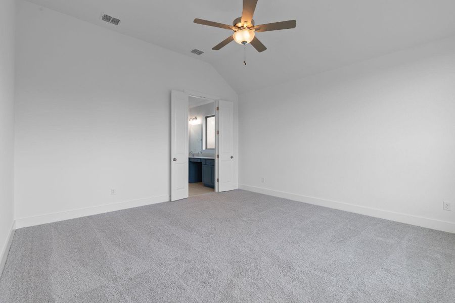 Primary Bedroom with elevated ceiling