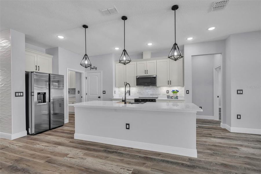 Furnished interior view inside a new home in , Poinciana (Image 7). Furnished interior view inside a new home in , Poinciana (Image 7).