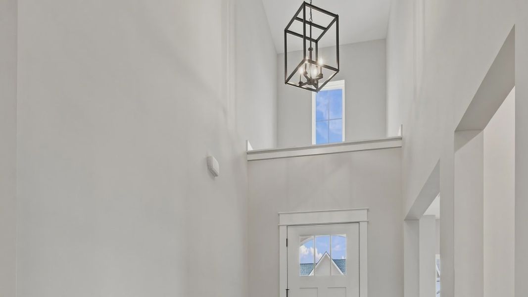 Immediate design and lighting to light up the living space and hallway as soon as you enter through the front door.