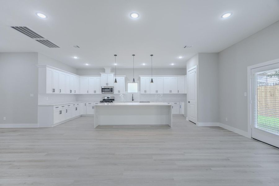 Formal dining room with elegant finishes and room for large gatherings