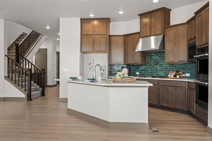 Furnished interior view inside a new home in Revel Crossing at Wolf Ranch - The Panorama Collection, Colorado Springs (Image 5).