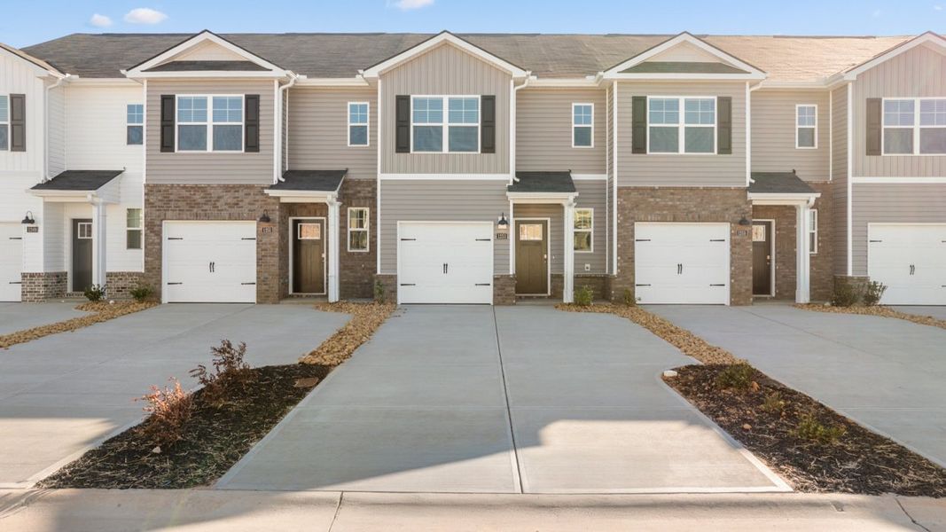 Front exterior of a new home in Weatherstone, Grovetown, GA, highlighting curb appeal (Image 1). Front exterior of a new home in Weatherstone, Grovetown, GA, highlighting curb appeal (Image 1).