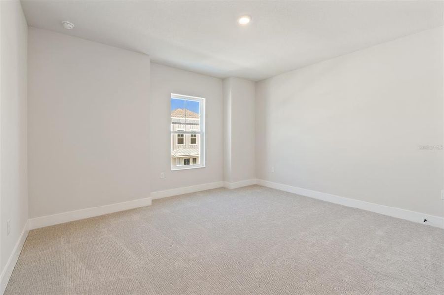 Spacious, unfurnished interior of a new home in Emerald Landing at Waterside at Lakewood Ranch – Cottage Series, Sarasota (Image 38).