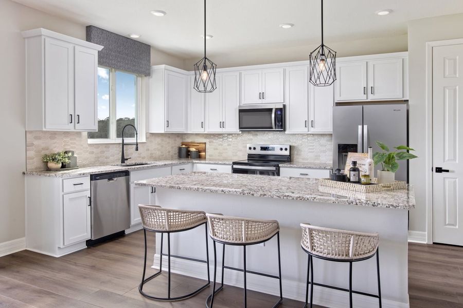 Representative furnished interior of a home built from the 2566 Modeled by KB Home in The Preserve at Legends Pointe II, Hudson (Image 7).