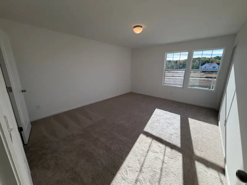 Spacious, unfurnished interior of a new home in Harris Place, Mooresville (Image 15).