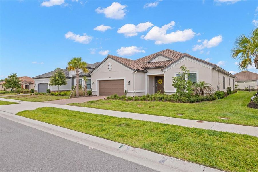 Front exterior of a new home in , Wesley Chapel, FL, highlighting curb appeal (Image 22). Front exterior of a new home in , Wesley Chapel, FL, highlighting curb appeal (Image 22).