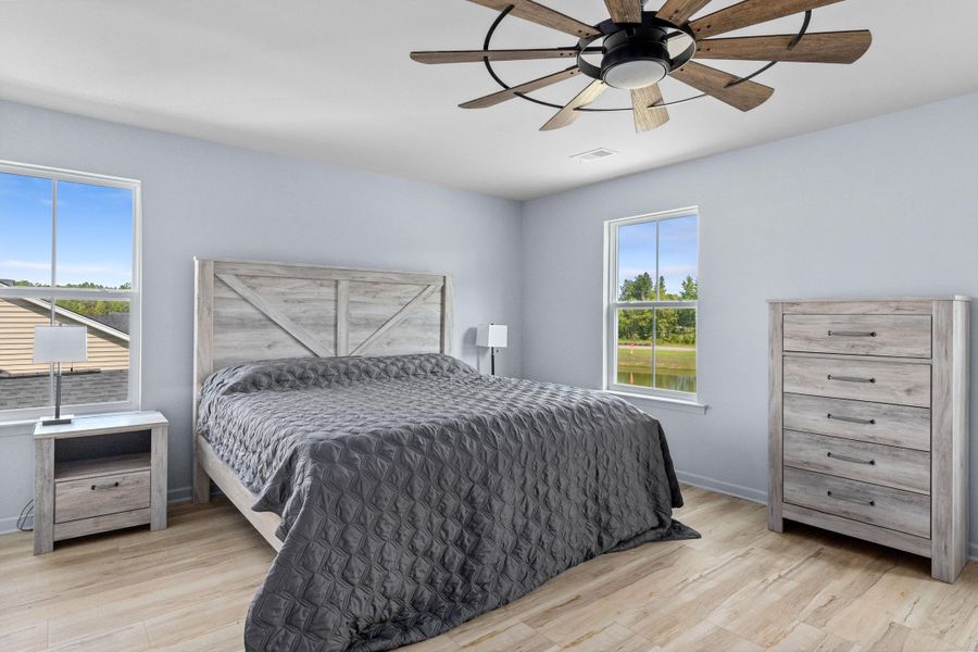 Furnished interior view inside a new home in Sweetgrass at Summers Corner, Summerville (Image 29).