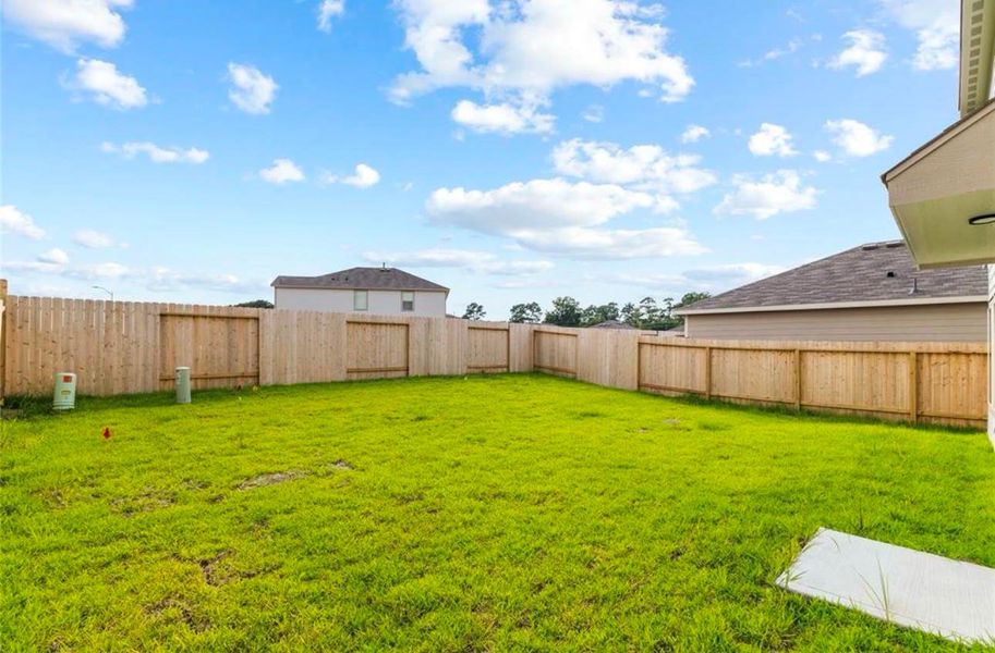 Exterior details and patio area of a home in , Houston (Image 3). Exterior details and patio area of a home in , Houston (Image 3).