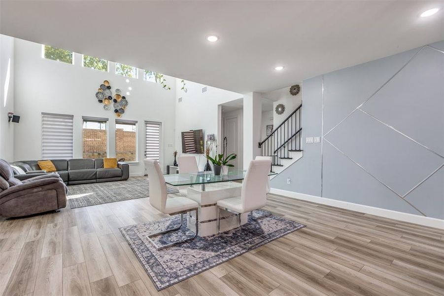Admire the spacious dining room with a gorgeous feature wall! Enjoy a two story living room with so much natural light! Admire the spacious dining room with a gorgeous feature wall! Enjoy a two story living room with so much natural light!
