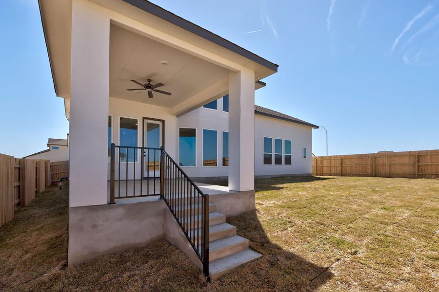 Exterior details and patio area of a home in Lariat, Liberty Hill (Image 2). Exterior details and patio area of a home in Lariat, Liberty Hill (Image 2).