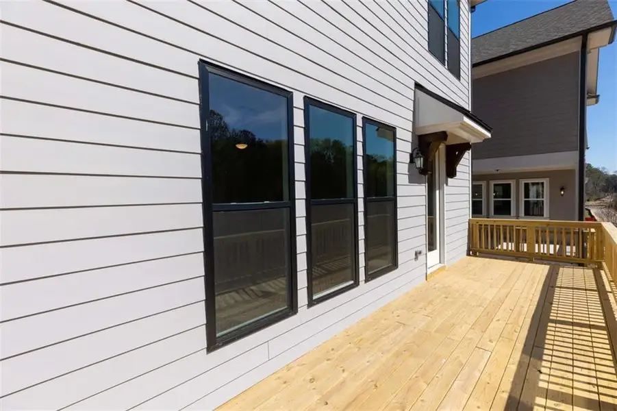 Exterior details and patio area of a home in Brackley Single Family, Cumming (Image 3).