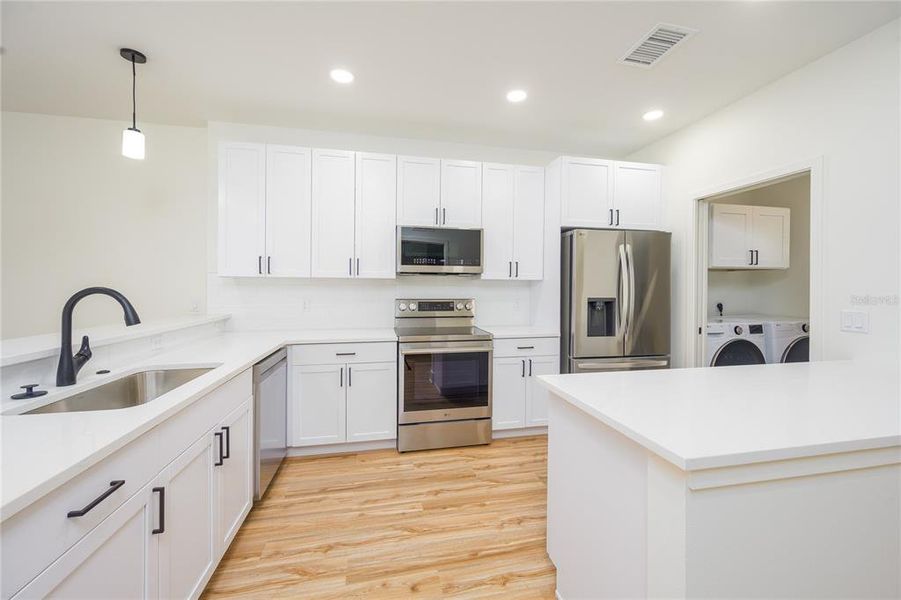 Furnished interior view inside a new home in , Ocala (Image 11).