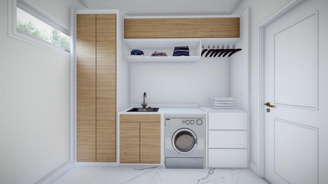 Washroom with cabinet space, washer / dryer, wet bar, and light marble finish flooring