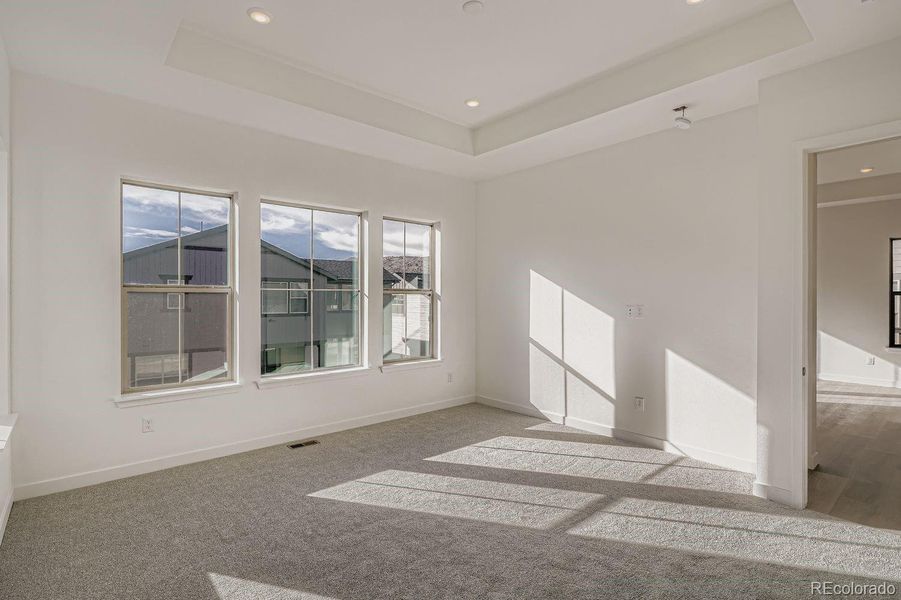 Spacious, unfurnished interior of a new home in Red Rocks Ranch: The Grand Collection, Morrison (Image 10).