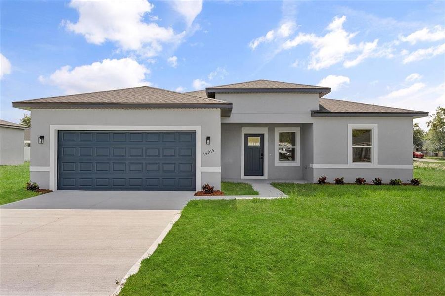 Front exterior of a new home in , Ocala, FL, highlighting curb appeal (Image 1).