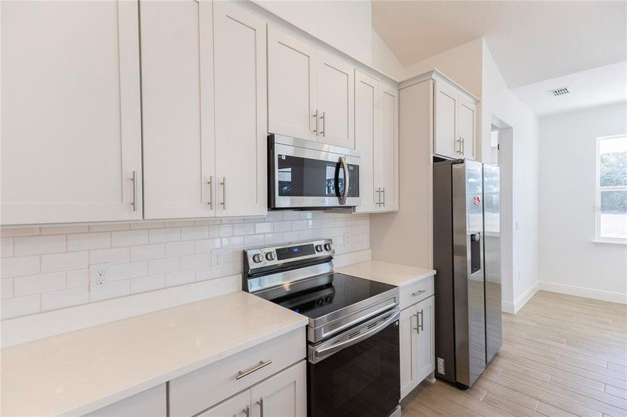 Furnished interior view inside a new home in , Webster (Image 10).