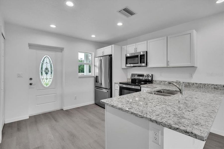 Furnished interior view inside a new home in , Punta Gorda (Image 9).