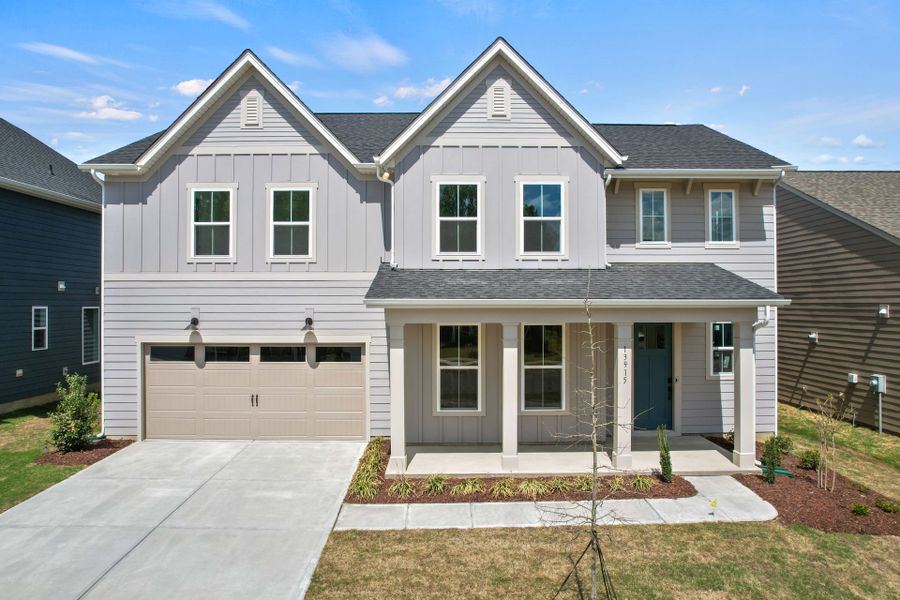 Representative exterior photo of a completed home built from the Montadale by Pulte Homes in Parkside Crossing, Charlotte, NC (Image 26). Representative exterior photo of a completed home built from the Montadale by Pulte Homes in Parkside Crossing, Charlotte, NC (Image 26).