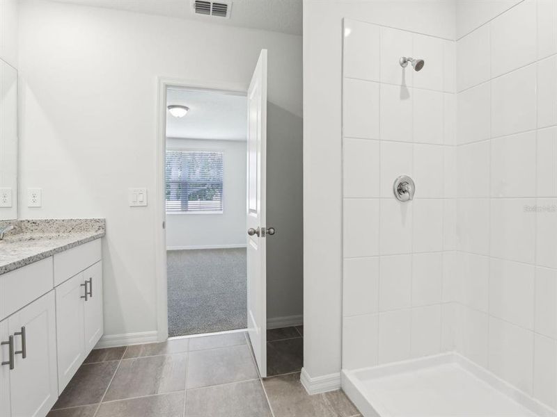 Furnished interior view inside a new home in The Reserve at Van Oaks, Auburndale (Image 13).