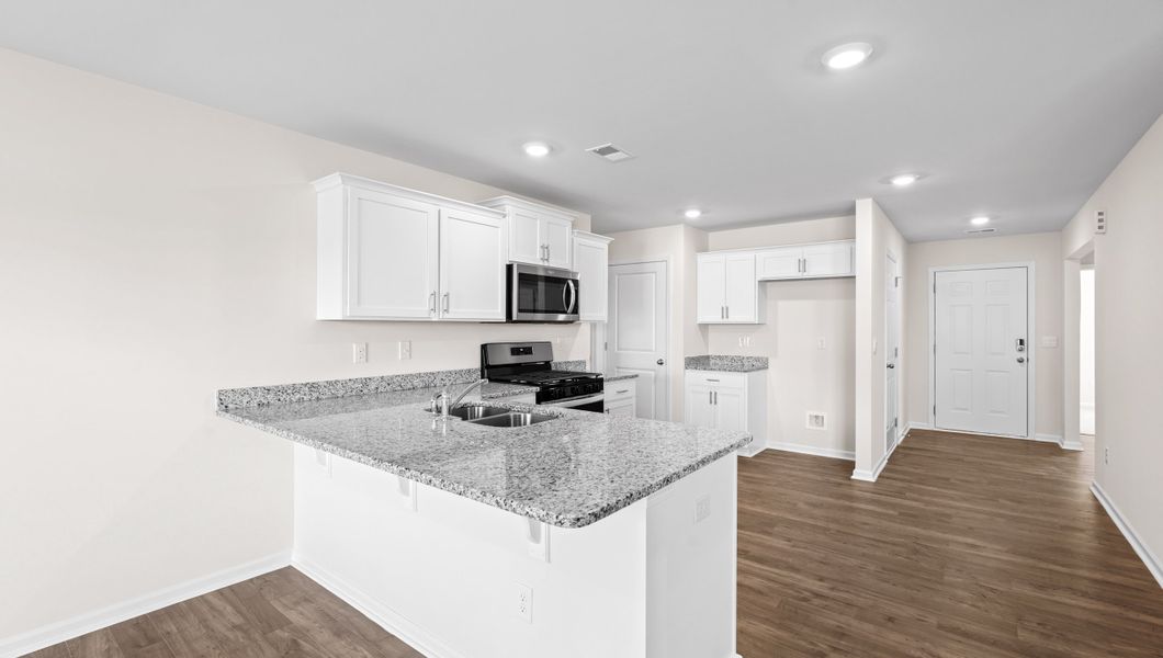 Representative furnished interior of a home built from the Macon by D.R. Horton in Lightwood Cottages, Moore (Image 6).