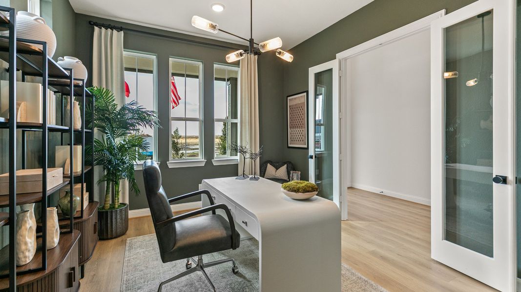 Representative furnished interior of a home built from the Rosewood by Brightland Homes in Sunterra, Katy (Image 6).