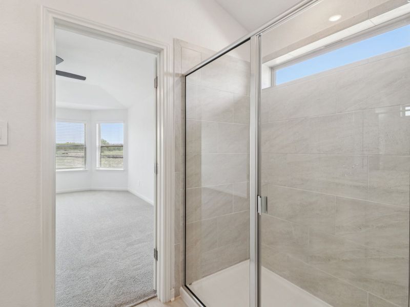 Primary suite bathroom in the Callaghan floorplan at a Meritage Homes community. Primary suite bathroom in the Callaghan floorplan at a Meritage Homes community.