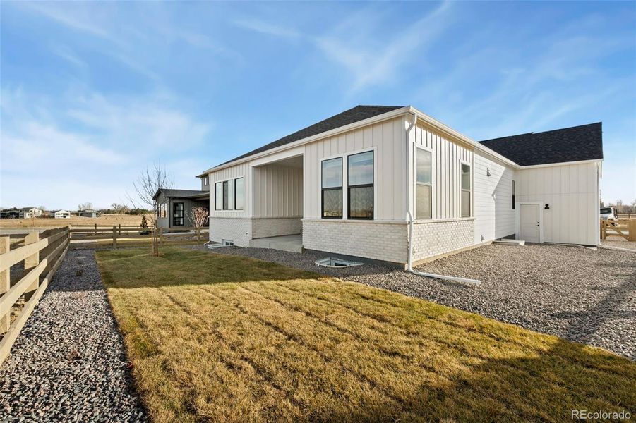 Exterior details and patio area of a home in Kitchel Lake at Serratoga Falls, Timnath (Image 3).