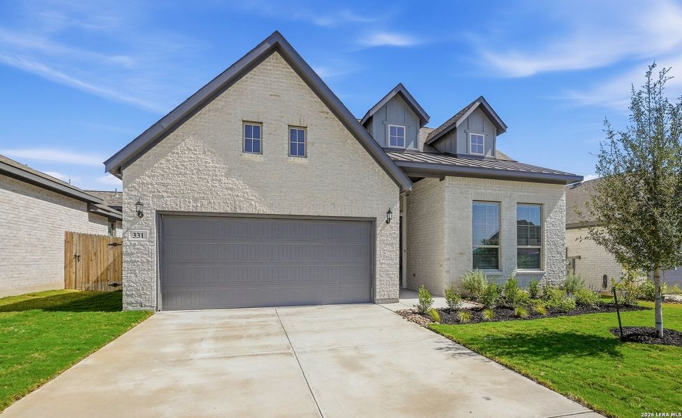 Front exterior of a new home in Alsatian Oaks, Castroville, TX, highlighting curb appeal (Image 26).