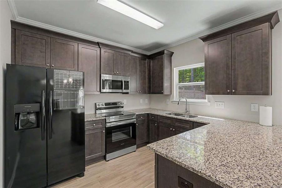 Furnished interior view inside a new home in Traditions at Cedarcrest, Dallas (Image 13).