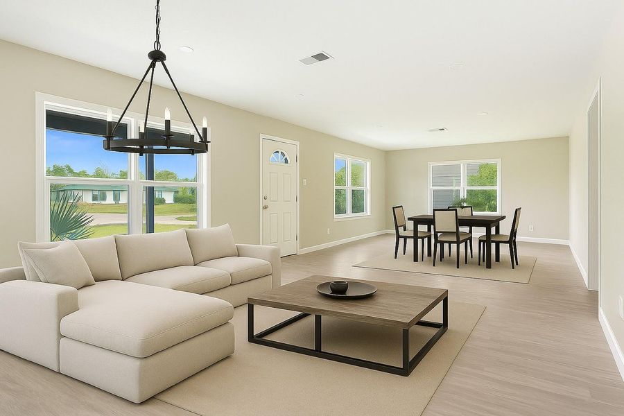 This photo showcases the large living and dining room space.  Plenty of room for all of your family enjoyment.