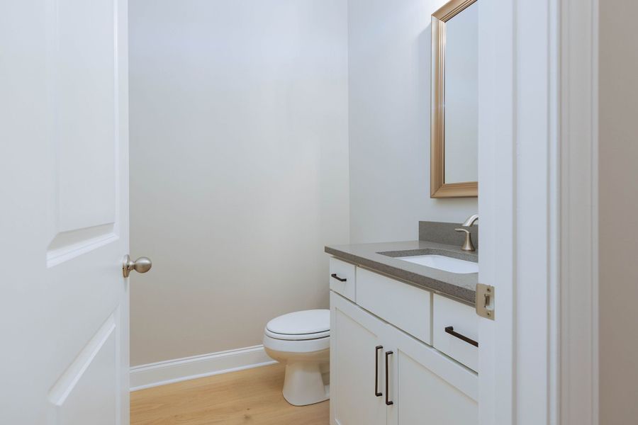 The powder room is easily accesible on the main level