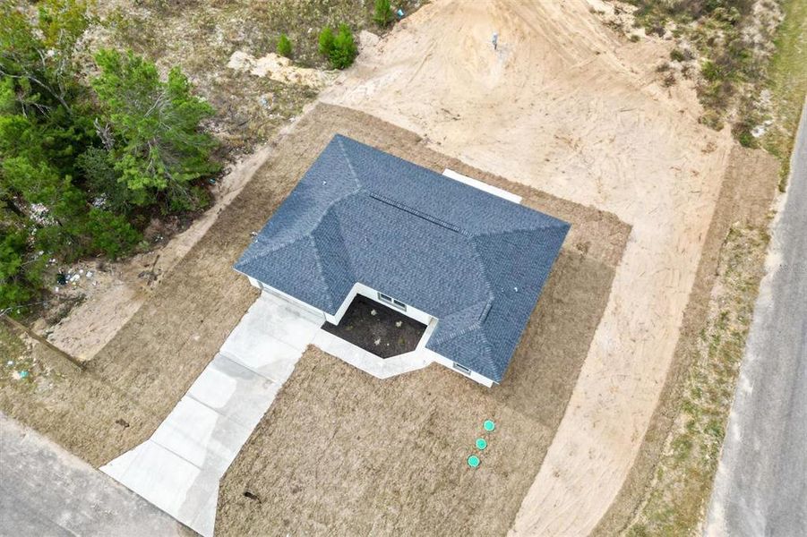 Front exterior of a new home in , Ocklawaha, FL, highlighting curb appeal (Image 19).
