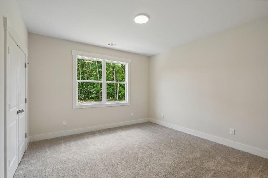 Spacious, unfurnished interior of a new home in Arden on Lanier, Cumming (Image 39).