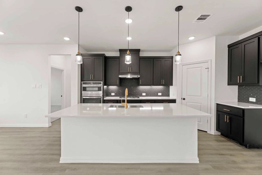 Kitchen featuring the Noir Collection Kitchen featuring the Noir Collection