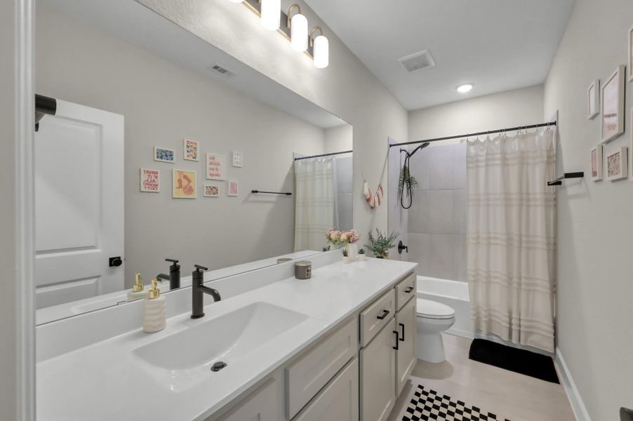 Furnished interior view inside a new home in The Woodlands Hills 60’, Willis (Image 11).