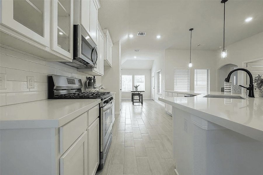 Representative furnished interior of a home built from the Avery 2137 C by Saratoga Homes in Kendall Lakes, Alvin (Image 5).