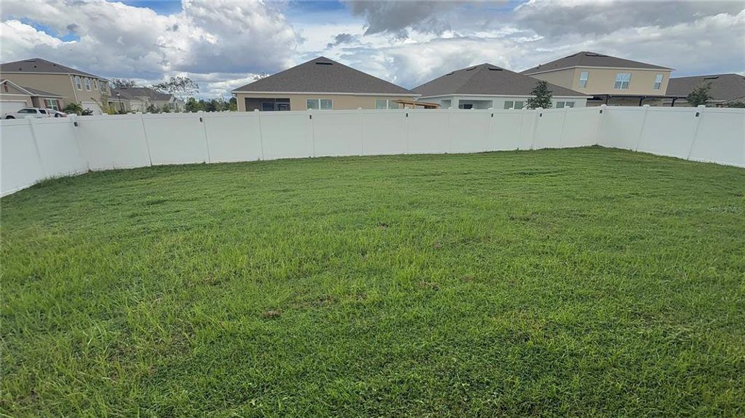 Front exterior of a new home in , Kissimmee, FL, highlighting curb appeal (Image 22).
