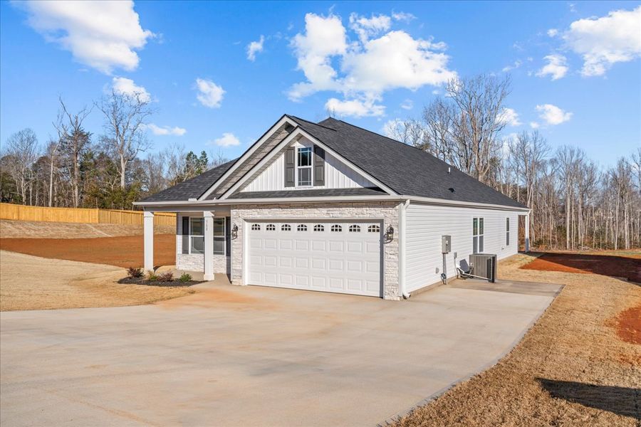Representative exterior photo of a completed home built from the Cheshire by Enchanted Homes in Hampshire Heights, Moore, SC (Image 19).