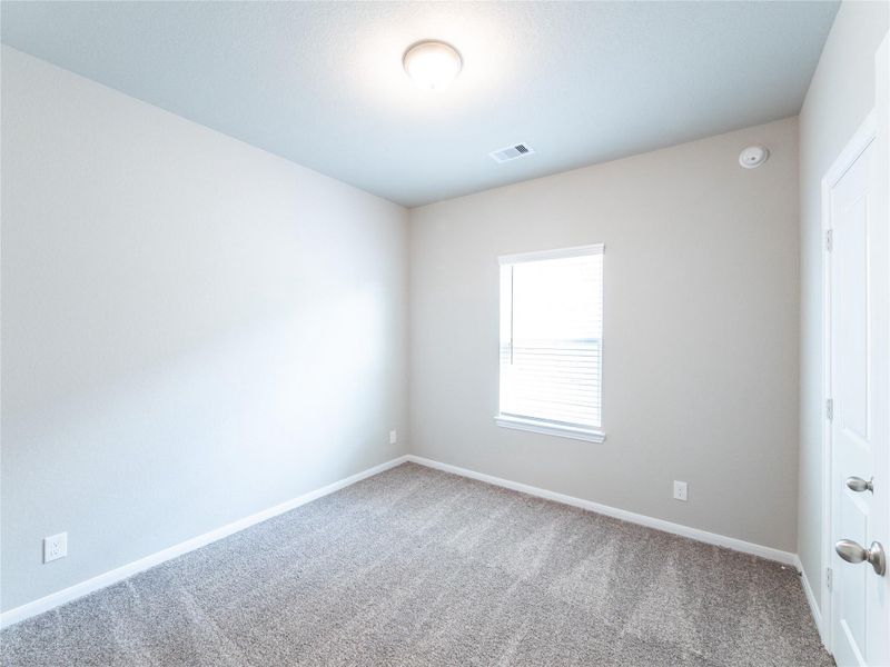 Spacious, unfurnished interior of a new home in Sweetgrass Village, Crosby (Image 12).