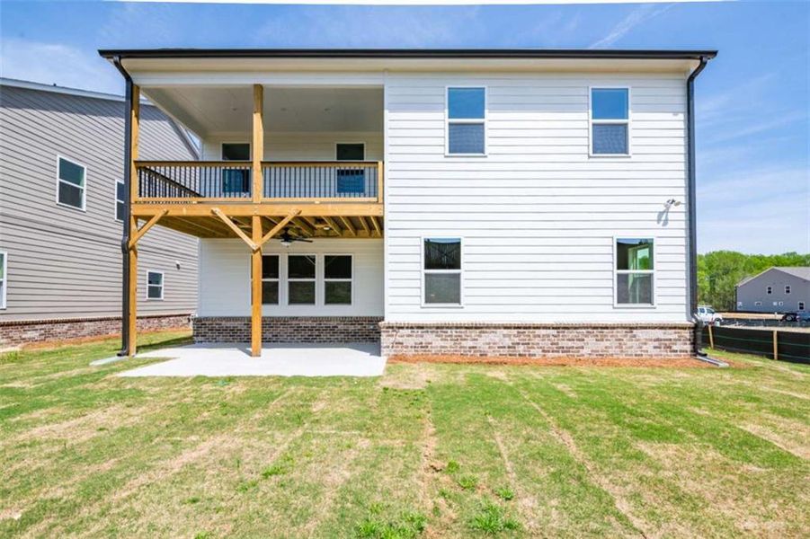 Exterior details and patio area of a home in The Paddocks at Doc Hughes, Buford (Image 2).